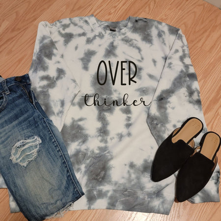 Junk Peddler hand crafted charcoal grey tie dye on white crewneck fleece with Over Thinker on center front.