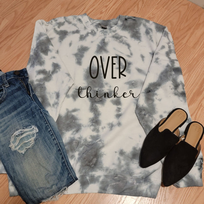 Junk Peddler hand crafted charcoal grey tie dye on white crewneck fleece with Over Thinker on center front.